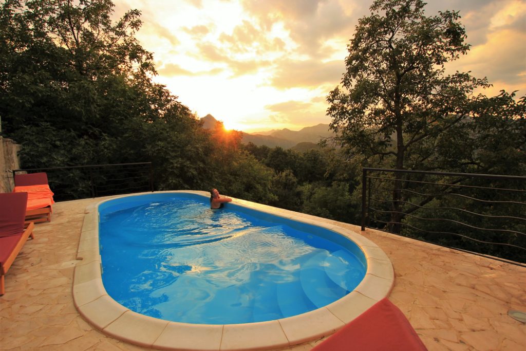 Swimming pool with a view at sunset