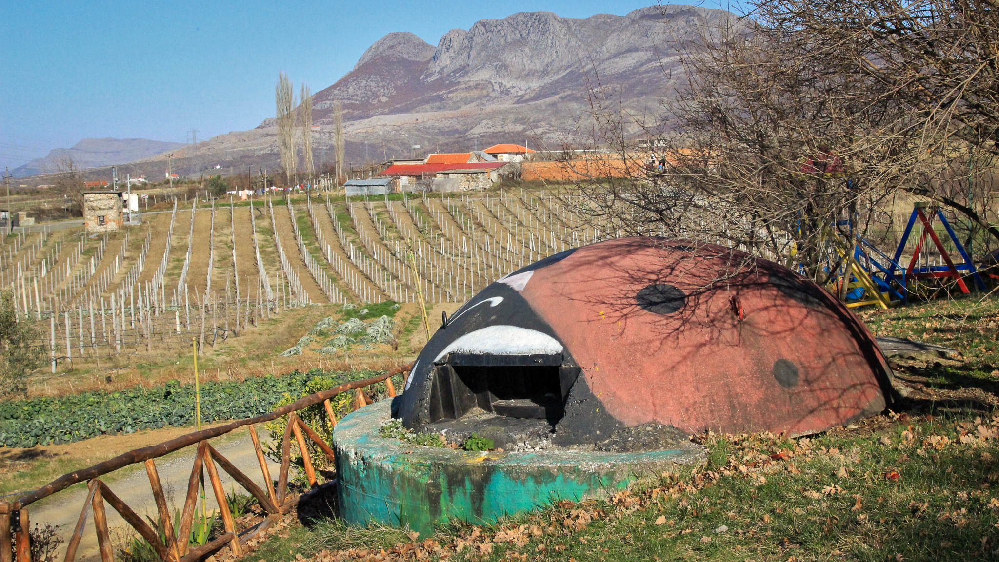 A reinvented cold war bunker in Albania that has been decorated as a ladybird