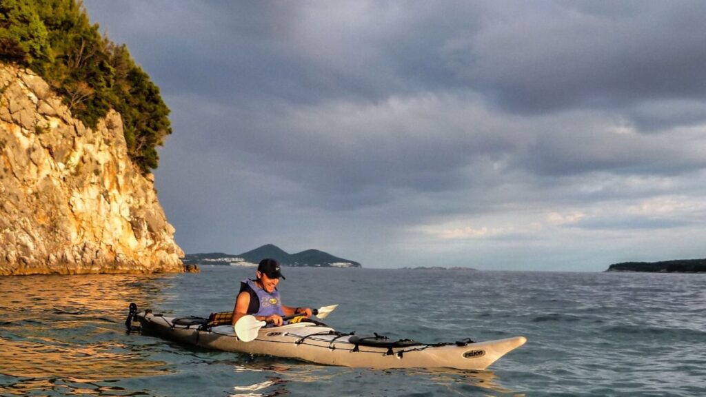 Robi, our Croatia tour guide, sea kayaking