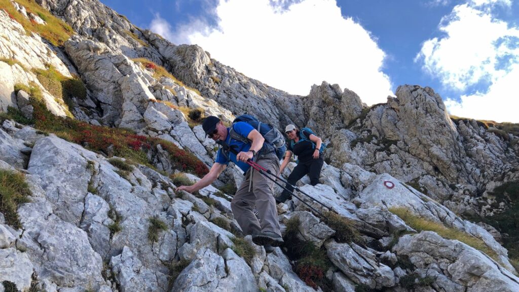 Adventure travel for couples. Couple hiking in the Dinaric Alps