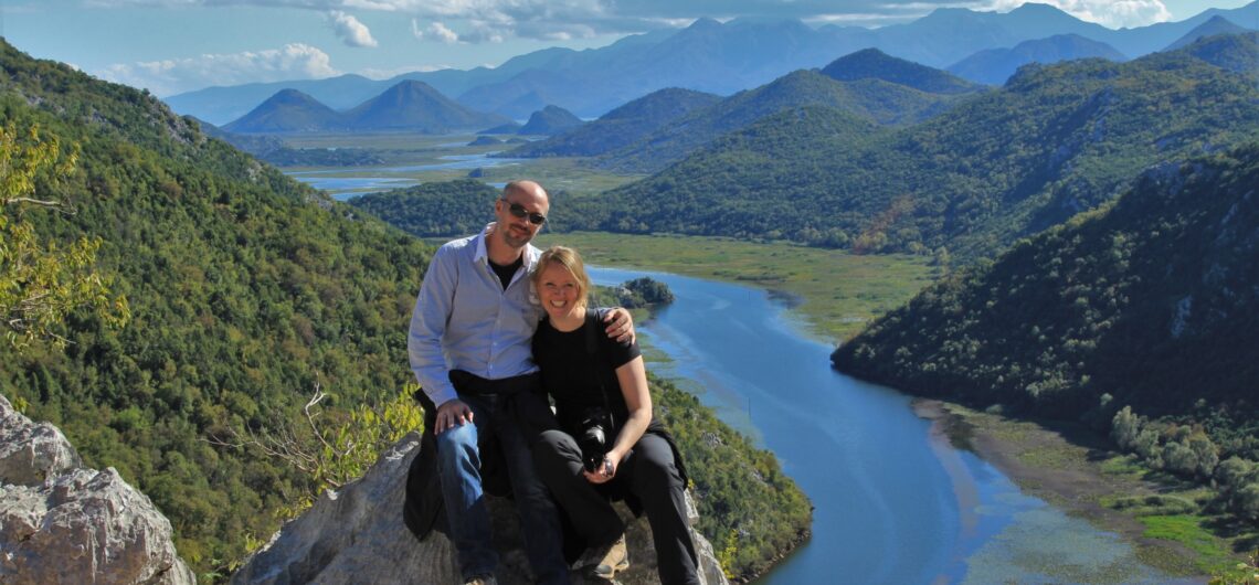 Couples adventure holidays. Couple in front of Lake Skadar, Montenegro - Undiscovered Balkans.