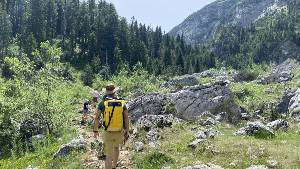 Hiking in Kosovo to the wild swimming lakes in Rugova canyon during summer.