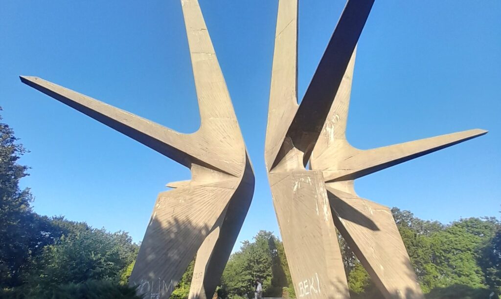 Yugoslav brutalist monuments Balkan hiking holidays modernist architecture former Yugoslavia spoken ik guide Yugoslavia Cold War history Tito's Yugoslavia brutalist architecture Balkans Bosnia hiking holiday Sutjeska national park hiking Montenegro activity holiday North Macedonia travel Balkans adventure travel former Yugoslavia travel guide WWII memorials Europe anti-fascist monuments off-the-beaten-path Europe Balkans nature and culture Yugoslavia architecture tour Belgrade day trips Lake Skadar Montenegro Kozara national park Bosnia Dalmatia coastal hiking Ohrid North Macedonia