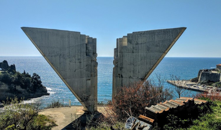 Yugoslav brutalist architecture on a Balkan hiking holiday.