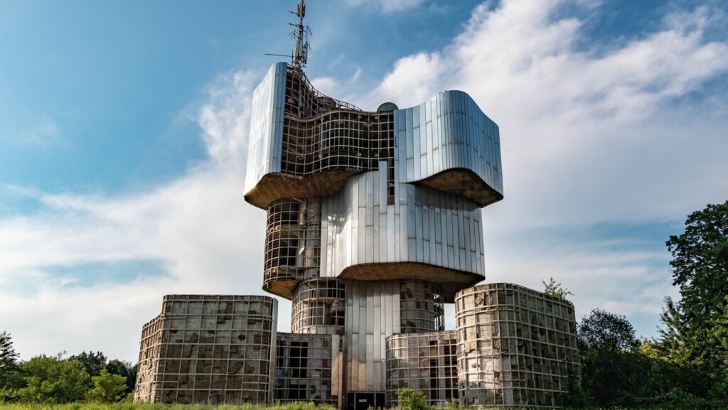 Yugoslav brutalist monuments Balkan hiking holidays modernist architecture former Yugoslavia spoken ik guide Yugoslavia Cold War history Tito's Yugoslavia brutalist architecture Balkans Bosnia hiking holiday Sutjeska national park hiking Montenegro activity holiday North Macedonia travel Balkans adventure travel former Yugoslavia travel guide WWII memorials Europe anti-fascist monuments off-the-beaten-path Europe Balkans nature and culture Yugoslavia architecture tour Belgrade day trips Lake Skadar Montenegro Kozara national park Bosnia Dalmatia coastal hiking Ohrid North Macedonia