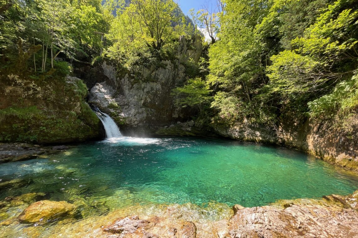 The Blue Eye in Theth National Park astonishes with its incredible blue-green water. It is one of Albania's best places for wild swimming in cold water.