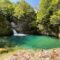 The Blue Eye in Theth National Park astonishes with its incredible blue-green water. It is one of Albania's best places for wild swimming in cold water.